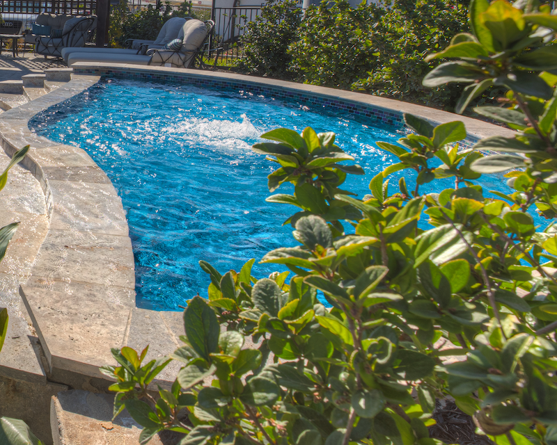 Serenity-side-view The Serenity in-ground pool spa measures 18'2” x 9’6”x10"